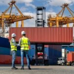 Engineers,Are,Overseeing,The,Transportation,Of,Cargo,With,Containers,Inside